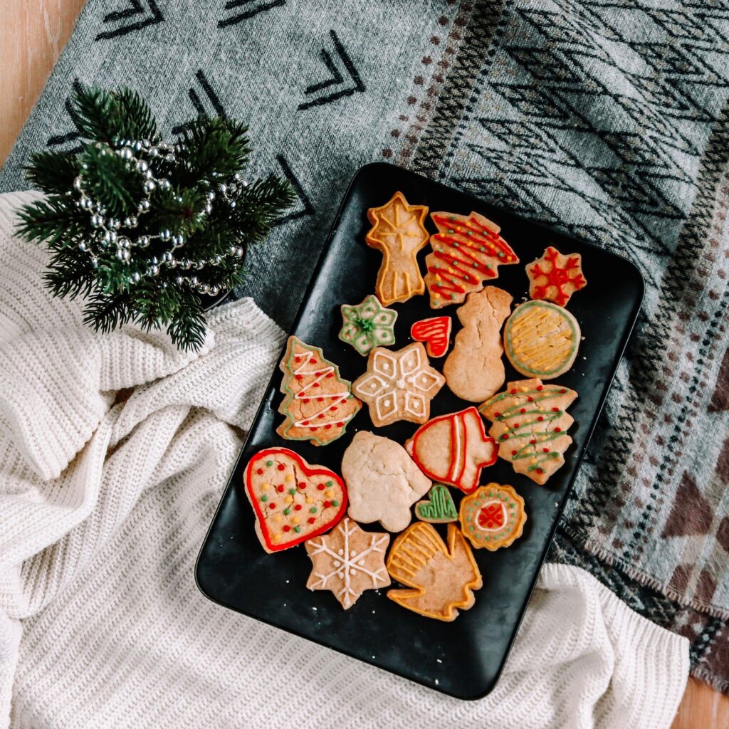 Christmas sugar cookies arranged on a tray, ready for gifting